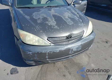 2004 Toyota Camry Le z USA, uszkodzony, nr VIN 4T1BE32K14U800424